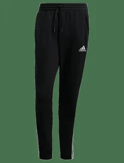 adidas Sportswear Joggingbyxor|Essentials French Terry Tapered 3-Stripes Joggers - Träningsbyxor