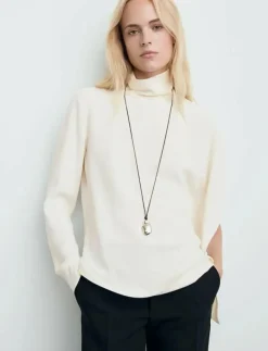 Kvinnor Mango Blusar & Skjortor|High-neck blouse with asymmetrical sleeves - Långärmade blusar
