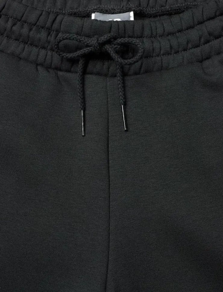 Kvinnor New Balance Mjukisbyxor|Linear Heritage Fleece Wide Leg Pant - Sweatpants