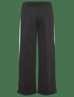 Kvinnor PUMA Byxor|Mjukisbyxor|T7 Low Rise Track Pants op - Sweatpants