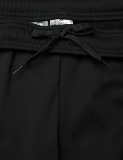 Kvinnor adidas Performance Byxor|Mjukisbyxor|TIRO25C WINPTW - Casual byxor