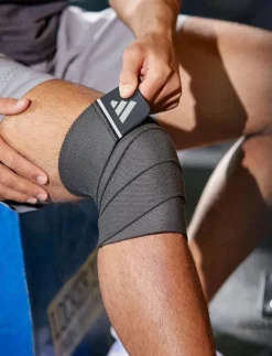 adidas Equipment Universal Support Wrap - Long - Knästöd|Kvinnor Sportutrustning|Sportutrustning
